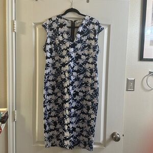 Navy, blue and white dress.  Silver zipper in back V-neck and capped sleeves